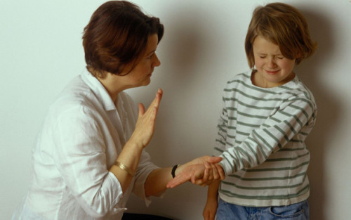 Mother teaching child